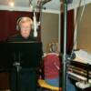 Msgr. Bob Jaeger Cutting A Vocal Track For The St Peter Christmas Album.